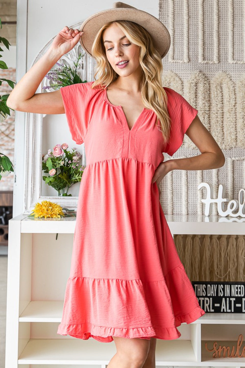 The Ruffled Notched Cap Sleeve Dress is a charming and feminine choice for any special occasion. Featuring delicate ruffles and stylish notched cap sleeves, this dress exudes elegance and sophistication. The flattering silhouette and versatile design make it a versatile addition to your wardrobe, perfect for both daytime events and evening affairs. Dress to impress in this stunning piece that will surely turn heads. S-XL