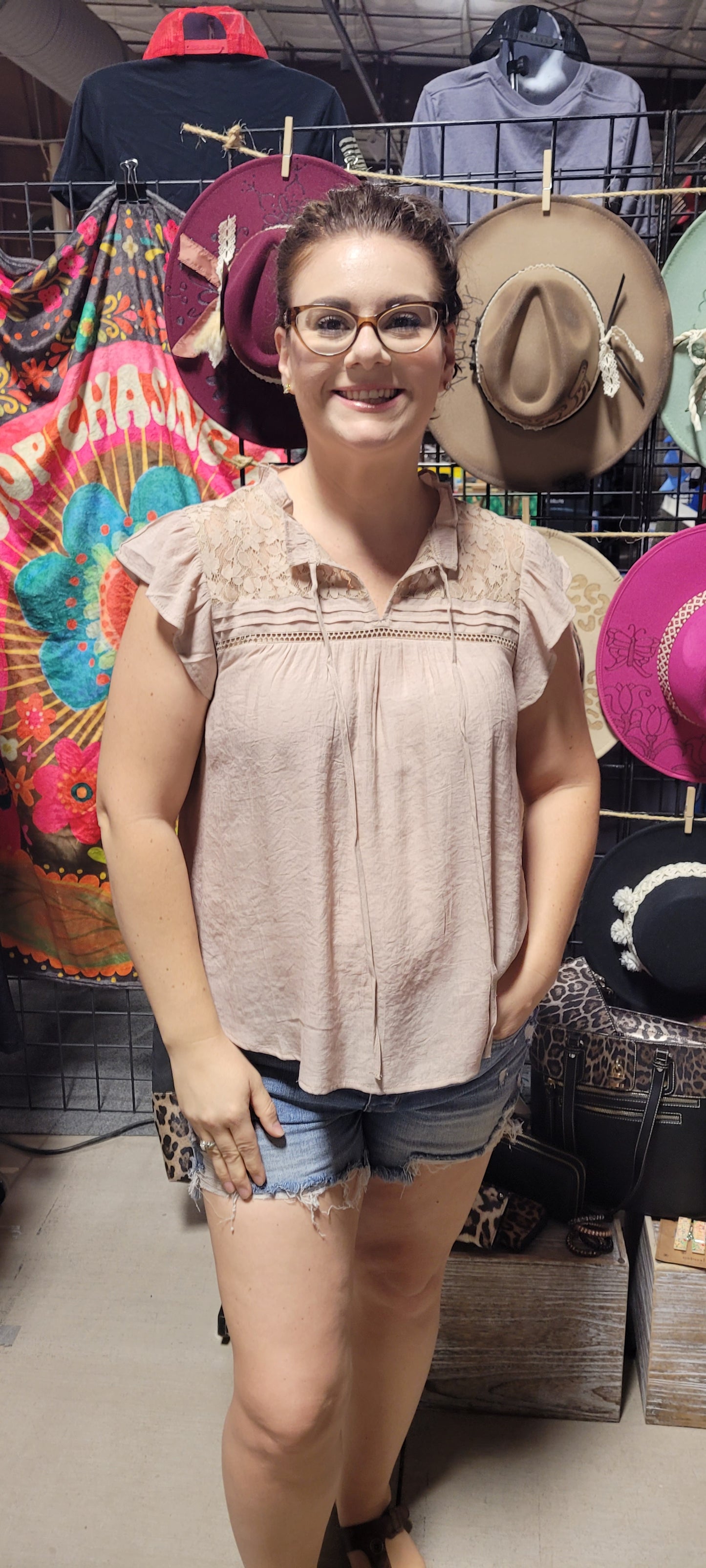 Freshen up your wardrobe with the "Faith Light Mocha" top! With split neckline, flutter sleeves, and lace detail, this top is perfect for any occasion. And tie it with a cute neck tie for an extra WOW factor. Be bold, be beautiful, and stay full of faith! Sizes small through large.