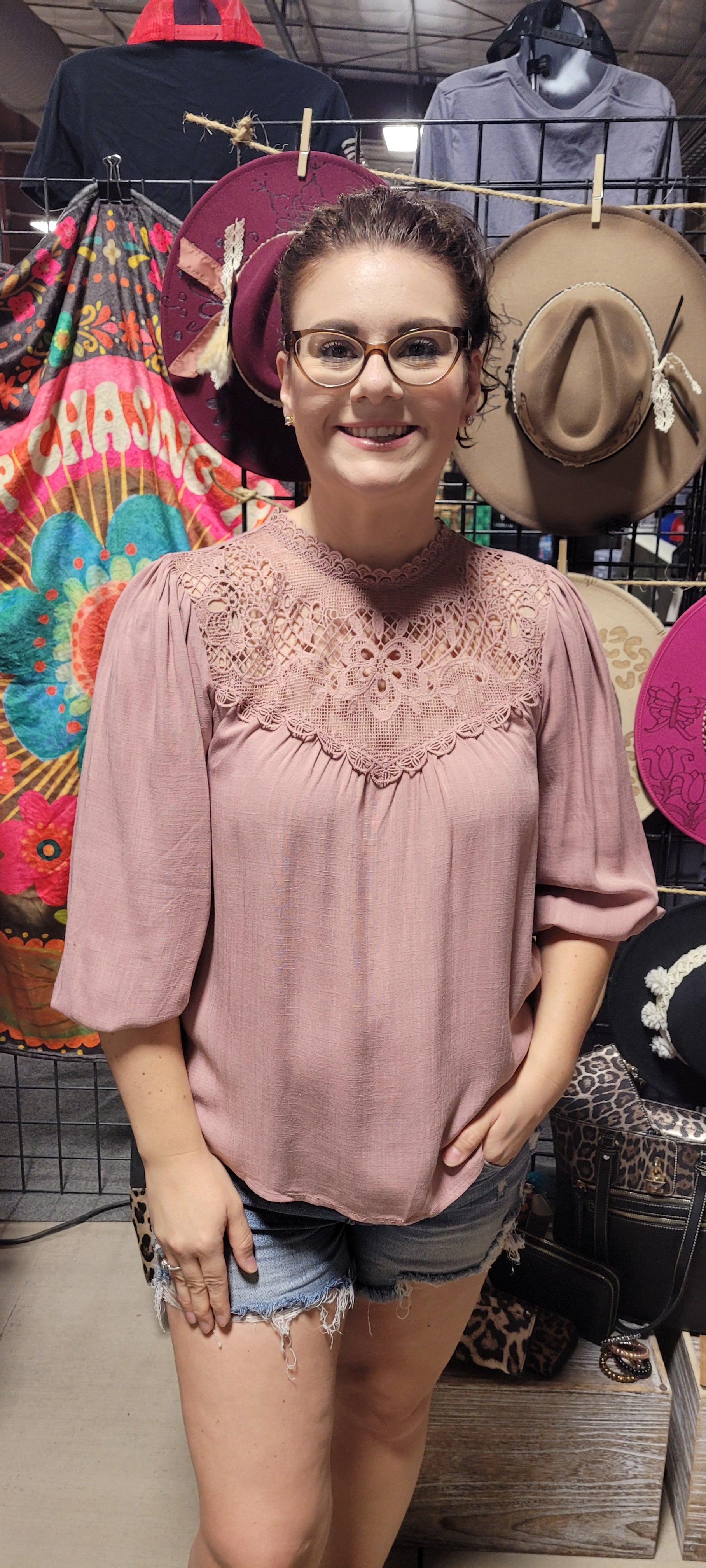 Rock your look with this ravishing top that'll take your fashion to the next level! With its elegant lace mock neck, stylish back-button closure with keyhole, and oh-so-pretty front lace inset and pleated bubble sleeves, you'll be sure to draw admiring glances wherever you go. Let's get fabulous! Sizes small through large.