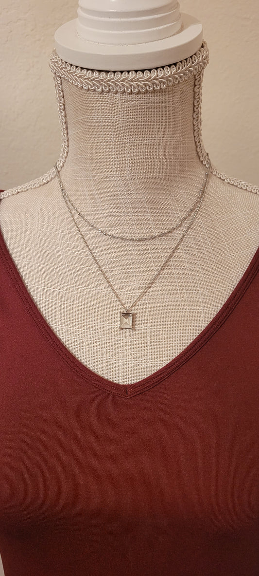 Approximate Length: Adjustable chain 16+2 inches Color: Silver link chain with silver beads and clear crystal Limited supply!