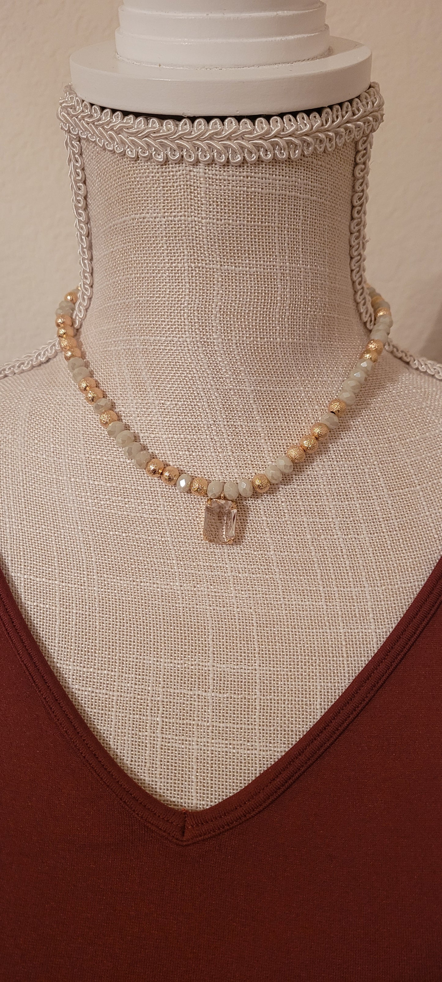Adjustable chain Color: Gold link chains with ivory & gold beads, clear crystal Limited supply!