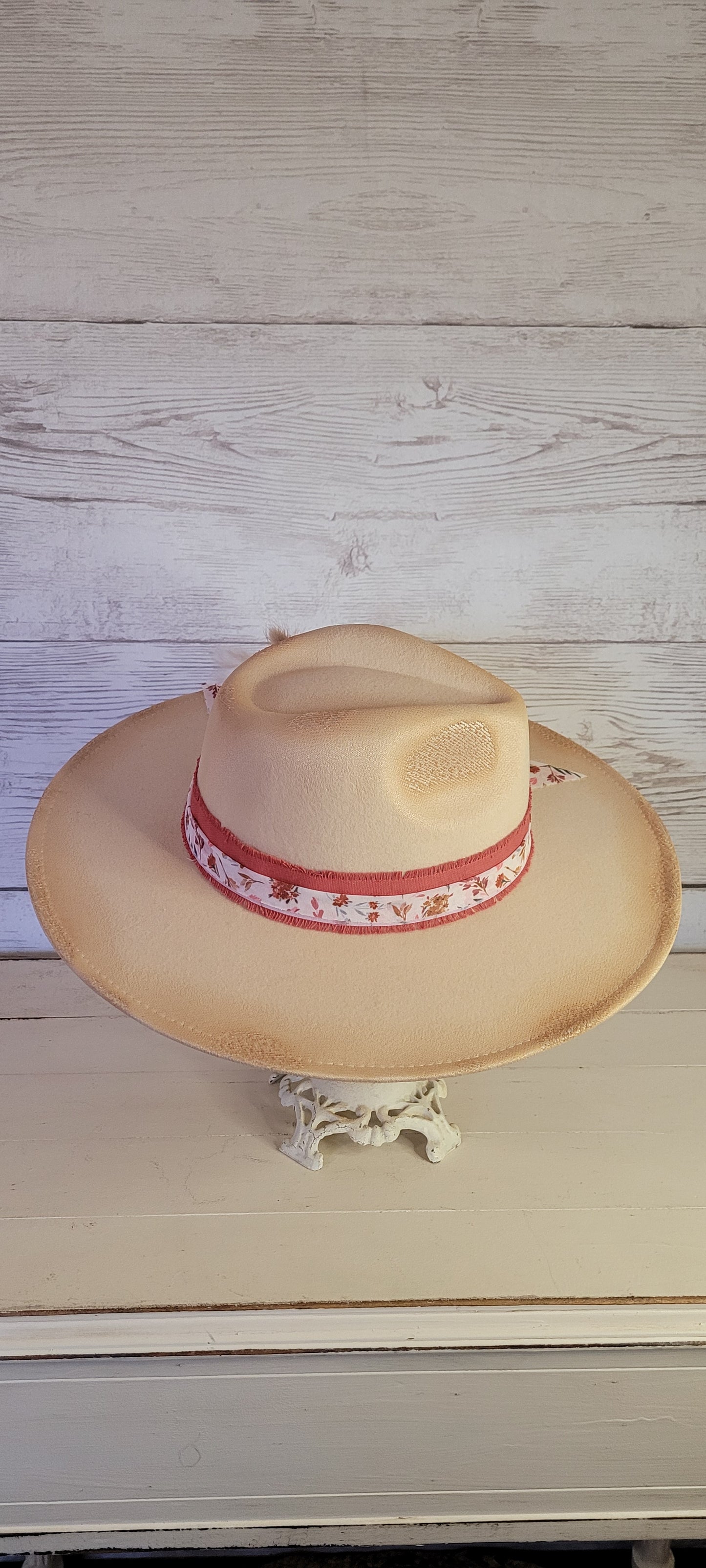 Lace ribbon, sheer floral ribbon, cattails, pampas & rhinestone brooch Felt hat Flat brim 65% polyester and 35% cotton Ribbon drawstring for hat size adjustment Head Circumference: 24" Crown Height: 5" Brim Length: 15.75" Brim Width: 14.5" Branded & numbered inside crown Custom designed by Kayla