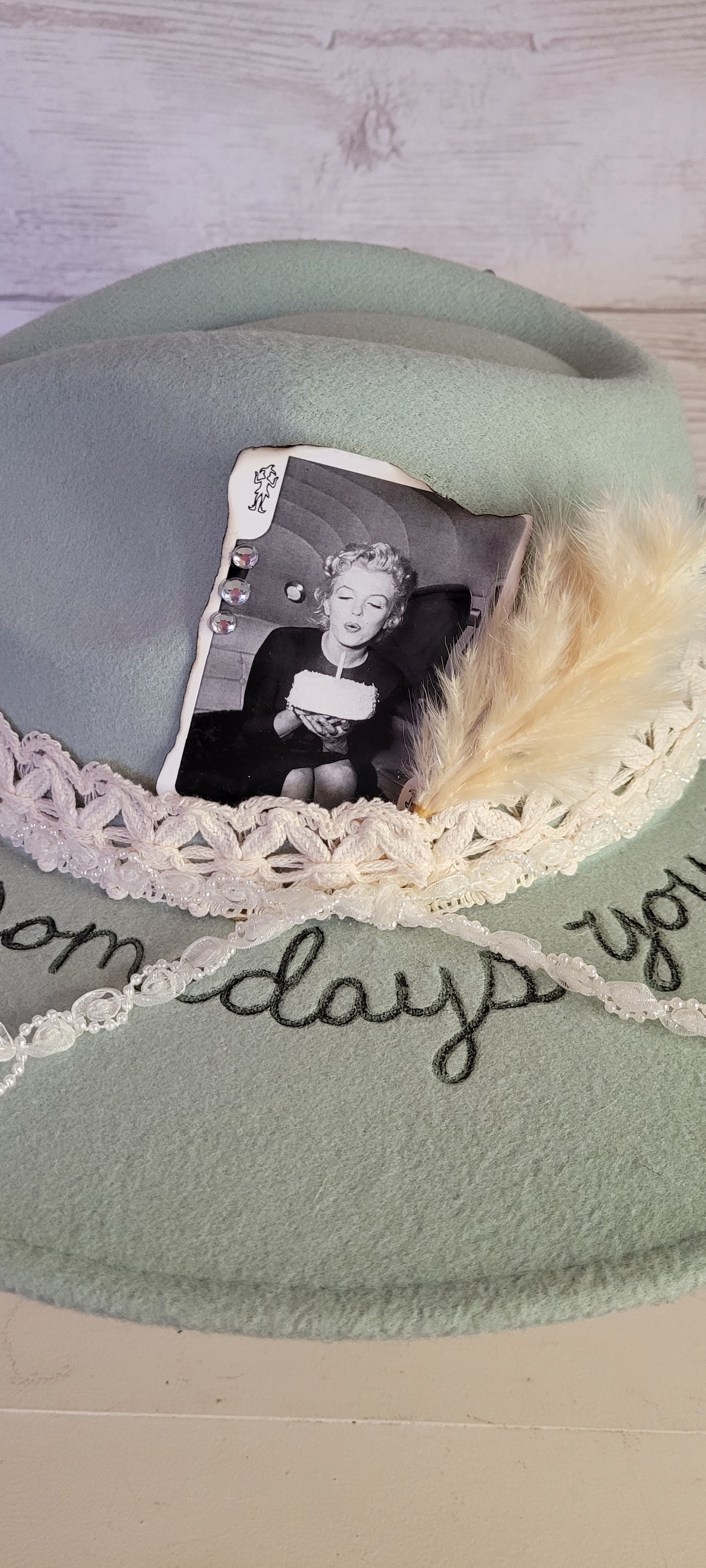 Features sunshine & "somedays you just have to create your own sunshine" engraved Natural lace ribbon, pearl lace ribbon, pampas, playing card with rhinestones Felt hat Flat brim 65% polyester and 35% cotton Ribbon drawstring for hat size adjustment Head Circumference: 24" Crown Height: 5" Brim Length: 15.75" Brim Width: 14.5" Branded & numbered inside crown Custom burned & engraved by Kayla