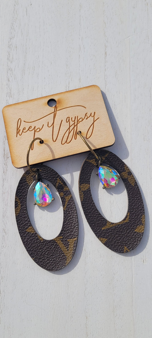 Upcycled Earrings Brown with AB Crystal  Limited supply!    Due to the nature of leather/suede, small variances of color in the skin may occur, this is in no way considered a defect. These are inherent characteristics of leather/suede and will enhance the individual look of your garment.