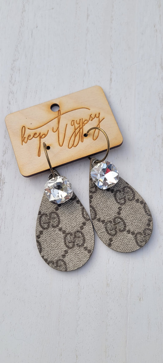 Upcycled Earrings Brown with Clear Crystal  Limited supply!    Due to the nature of leather/suede, small variances of color in the skin may occur, this is in no way considered a defect. These are inherent characteristics of leather/suede and will enhance the individual look of your garment.