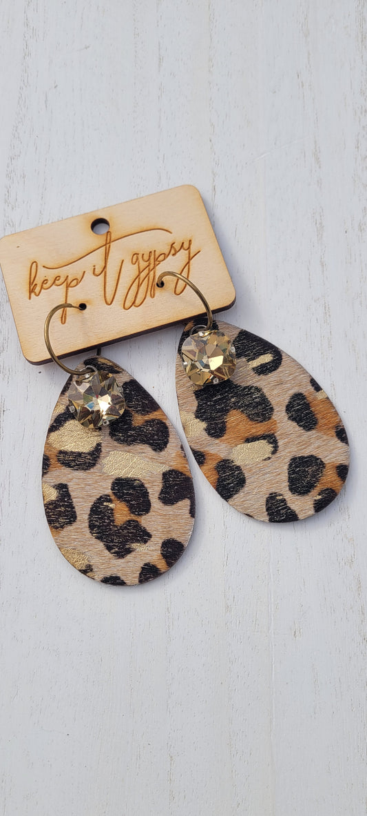 Upcycled Leather Leopard Print Cowhide Earrings Light Gold Crystals Brown, Camel, Black & Metallic Gold Limited supply!    Due to the nature of leather/suede, small variances of color in the skin may occur, this is in no way considered a defect. These are inherent characteristics of leather/suede and will enhance the individual look of your garment.
