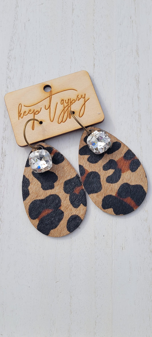 Upcycled Leather Leopard Print Cowhide Earrings Brown, Camel, Black Clear Crystals Limited supply!    Due to the nature of leather/suede, small variances of color in the skin may occur, this is in no way considered a defect. These are inherent characteristics of leather/suede and will enhance the individual look of your garment.