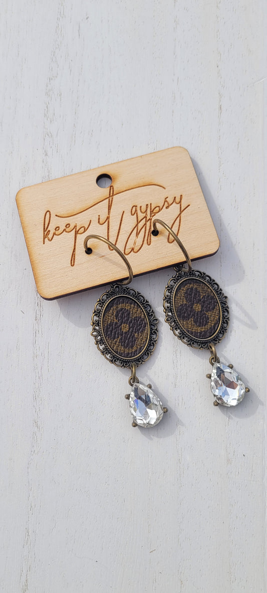 Upcycled Earrings Brown with Clear Crystal  Limited supply!    Due to the nature of leather/suede, small variances of color in the skin may occur, this is in no way considered a defect. These are inherent characteristics of leather/suede and will enhance the individual look of your garment.