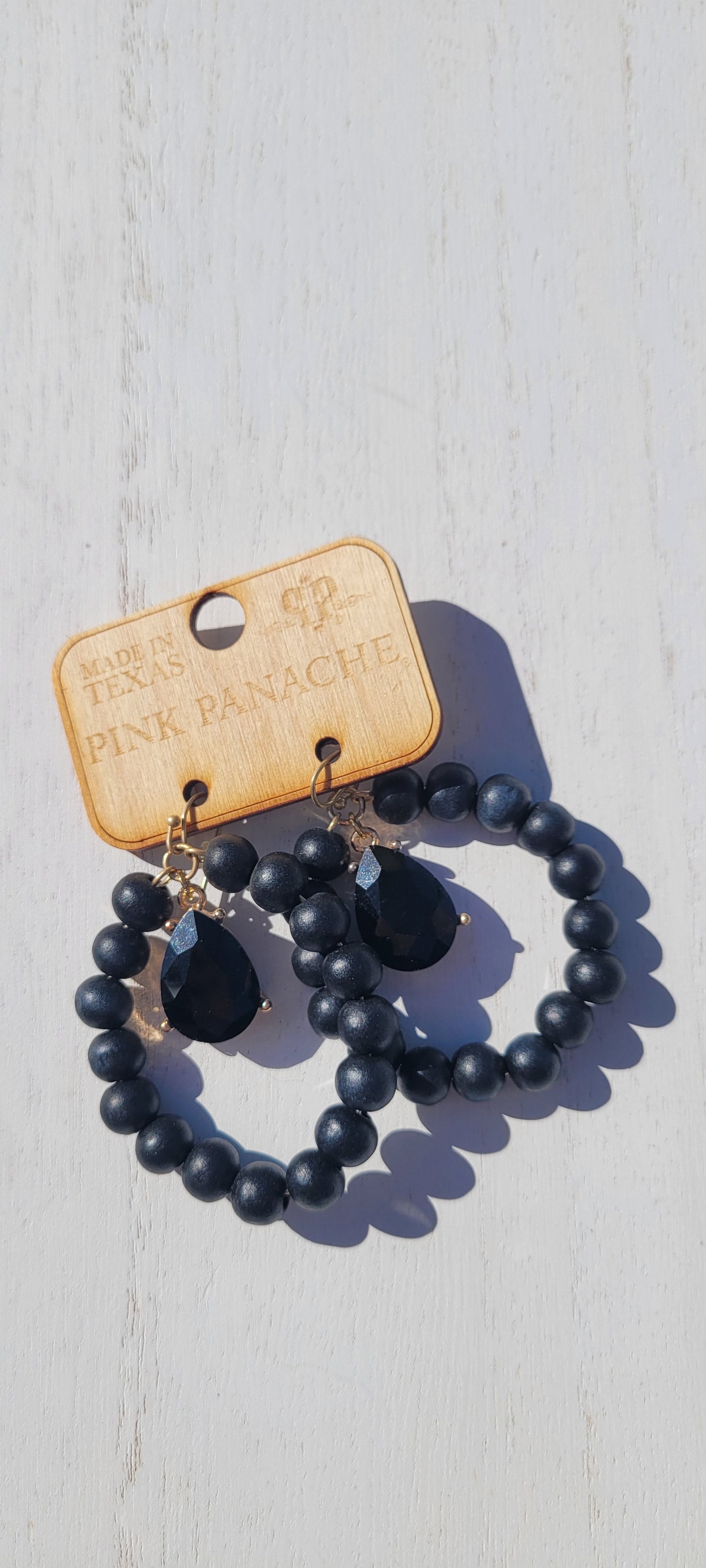 Pink Panache Earrings Color: Black wood bead circle earring with black teardrop Limited supply!