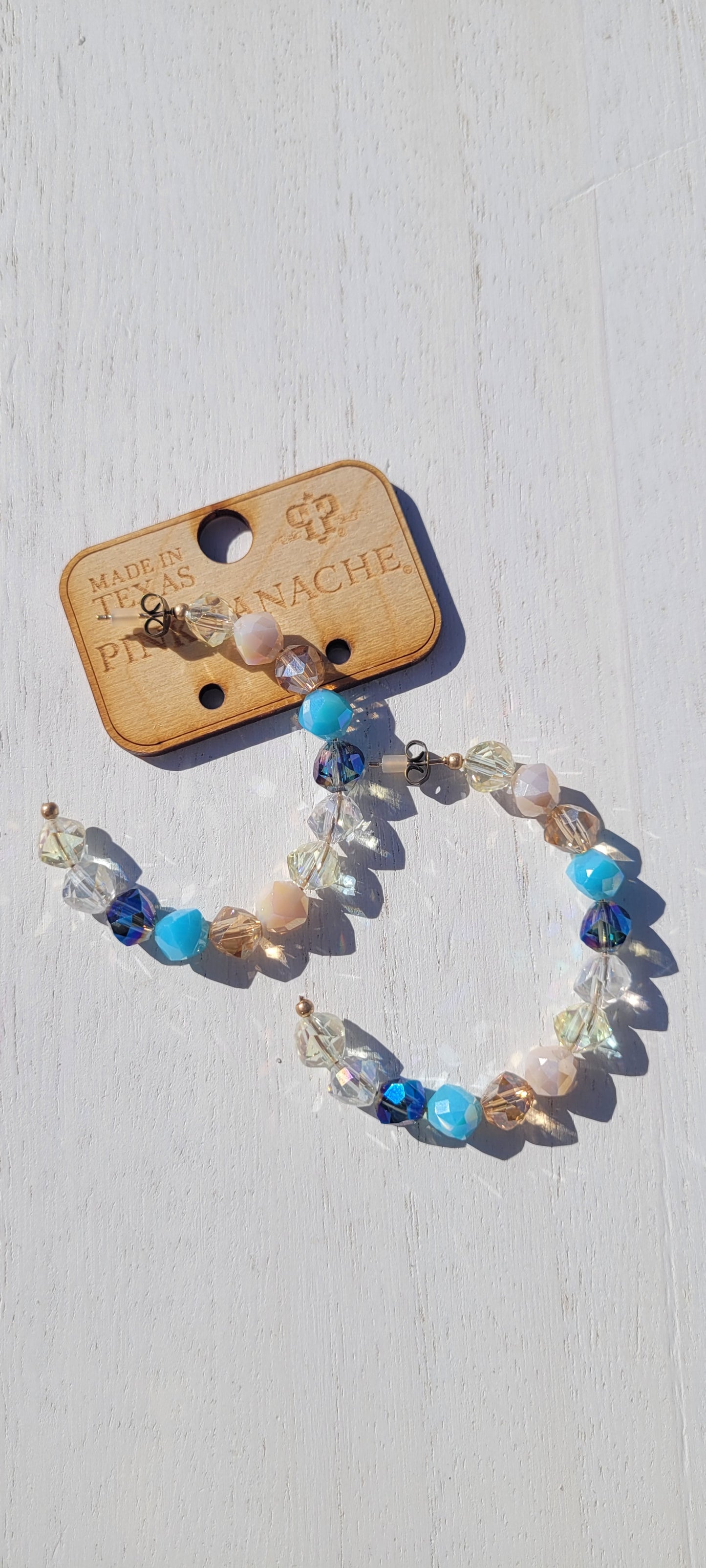 Pink Panache Earrings Color: Clear and blue crystal bead hoop earring Limited supply!