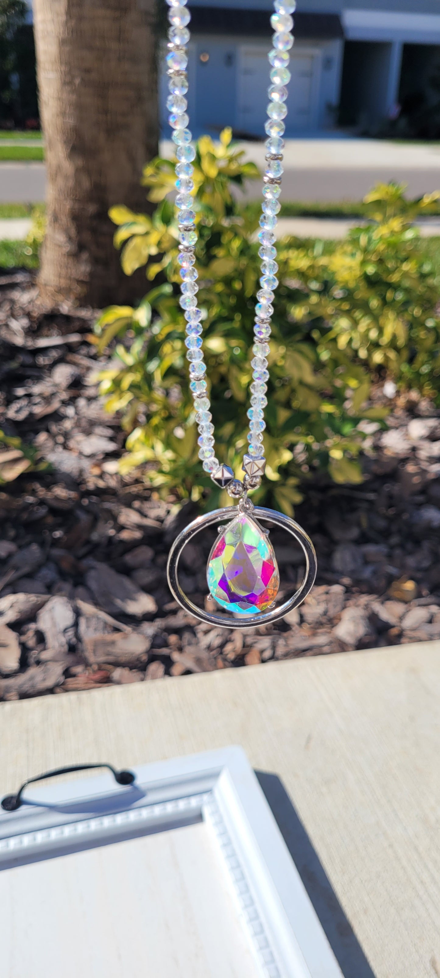 Pink Panache necklace Color: Clear bead and silver chain necklace with silver circle and AB teardrop pendant Limited supply!