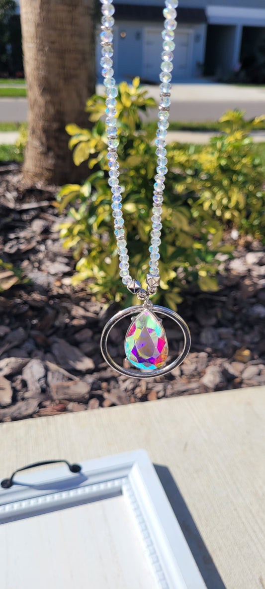 Pink Panache necklace Color: Clear bead and silver chain necklace with silver circle and AB teardrop pendant Limited supply!