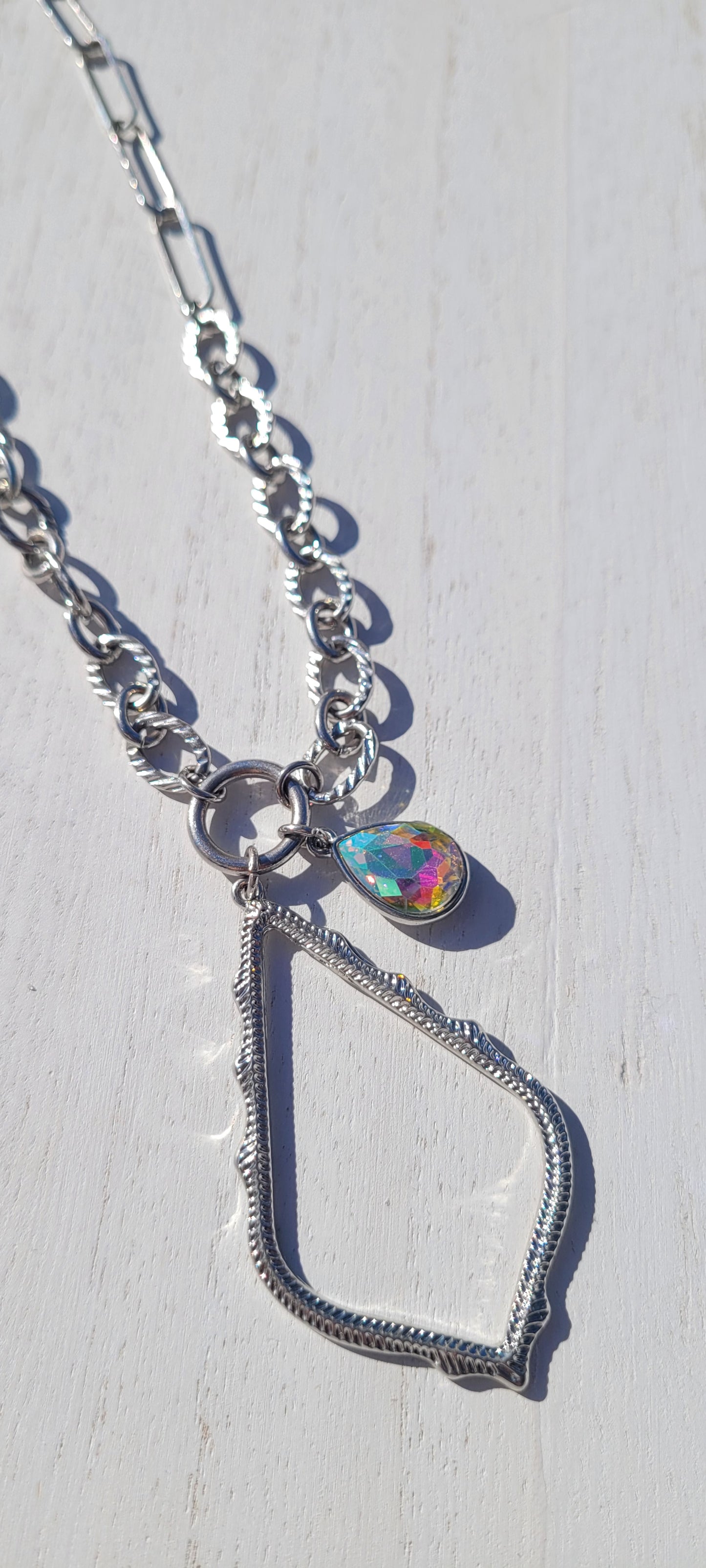 Pink Panache necklace Color: Silver chain necklace with diamond shape and AB teardrop Limited supply!