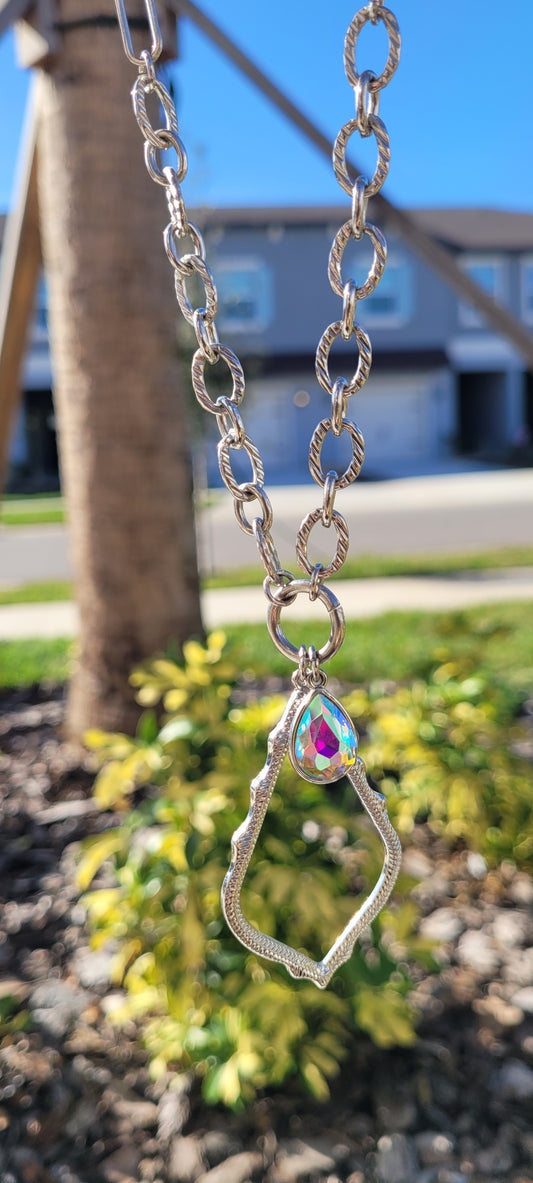 Pink Panache necklace Color: Silver chain necklace with diamond shape and AB teardrop Limited supply!