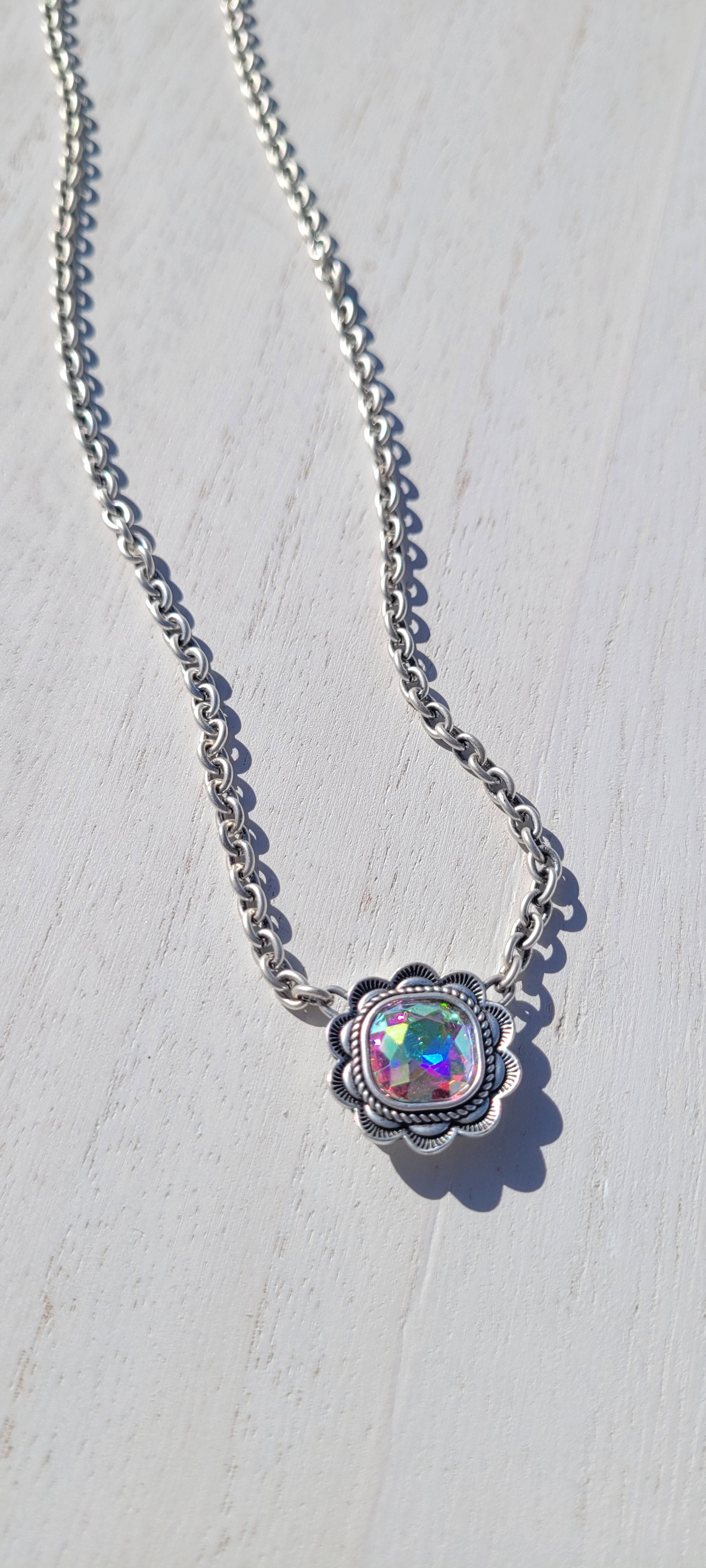 Pink Panache necklace Color: Small silver oval link chain necklace with 12mm silver/AB ruffle edge cushion cut pendant Limited supply!