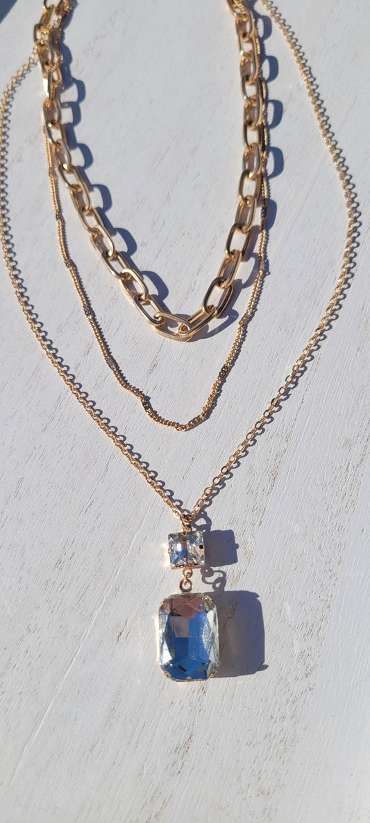 Pink Panache necklace Color: 3-strand gold chain necklace with clear square and rectangle rhinestone pendant Limited supply!