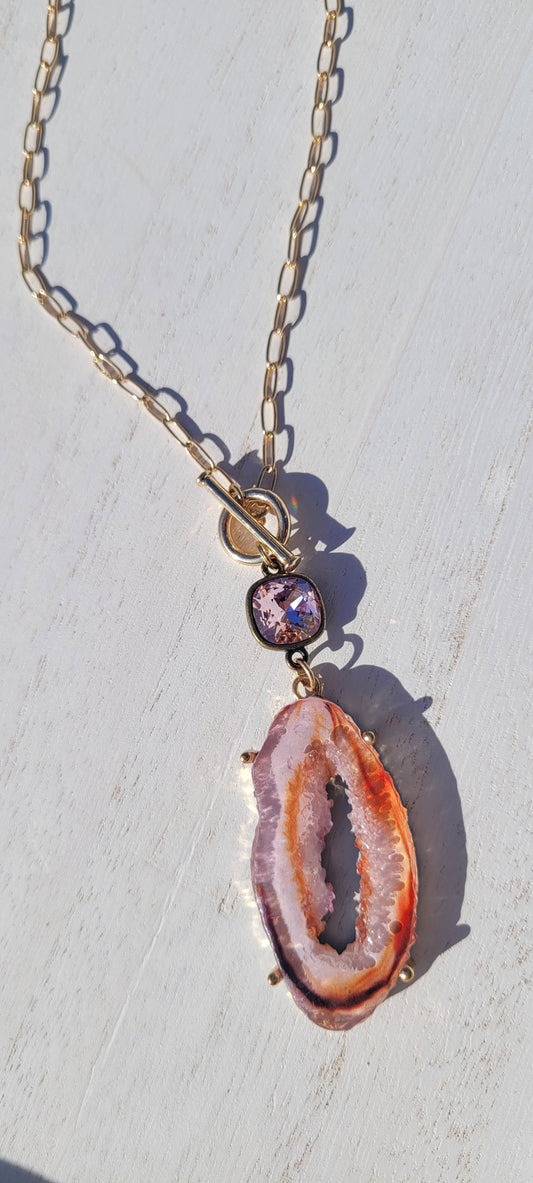 Pink Panache necklace Color: Long gold paperclip chain with toggle front and 10mm bronze/light rose cushion cut connector and open pink druzy pendant Limited supply!