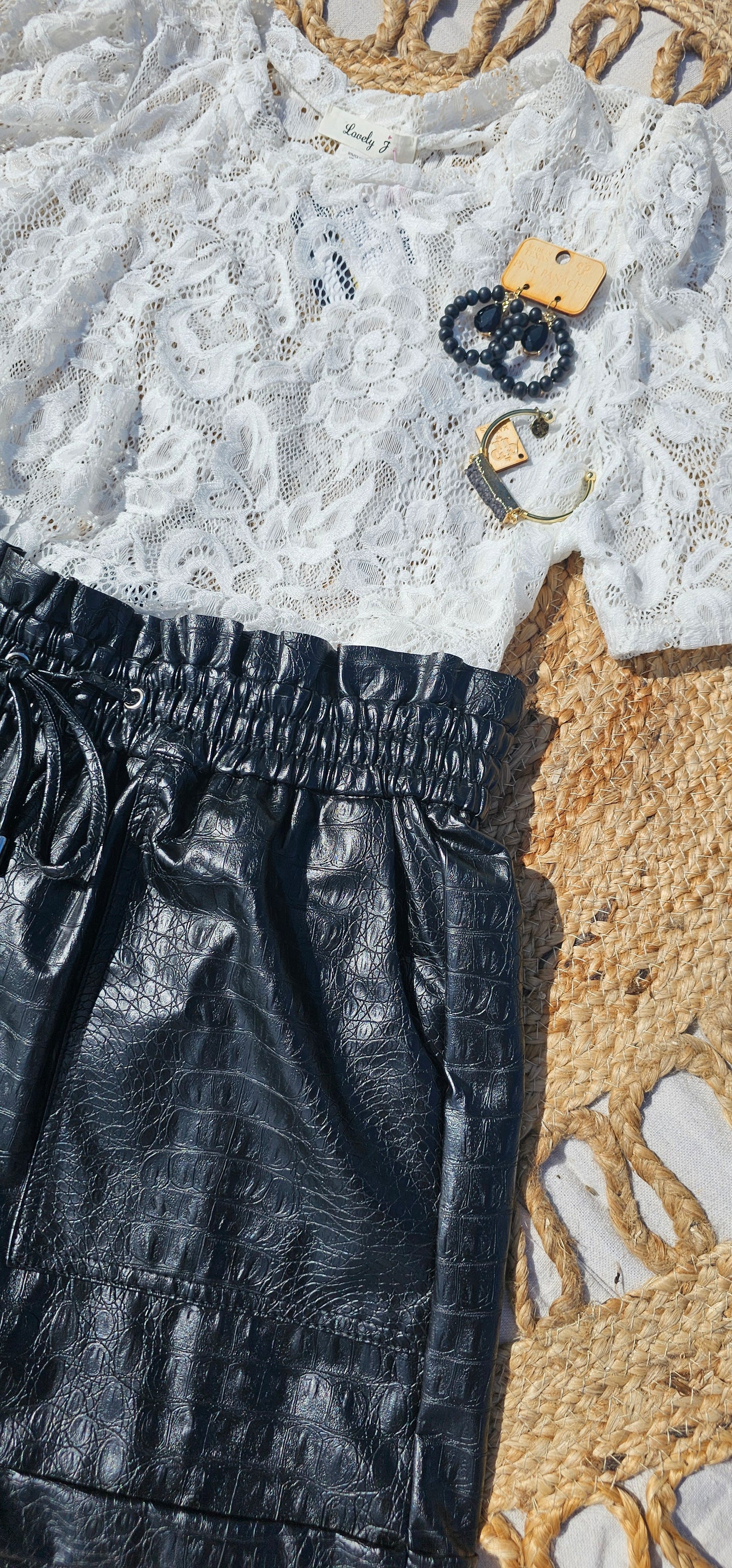 Crocodile Rock is a crocodile pattern, vegan leather, paper bag shorts, with a drawstring elastic waistline and pockets. These shorts are dressy enough to wear to the office, a weekend trip with the girls, or just because. I dare you to give them a try! Sizes small through x-large.