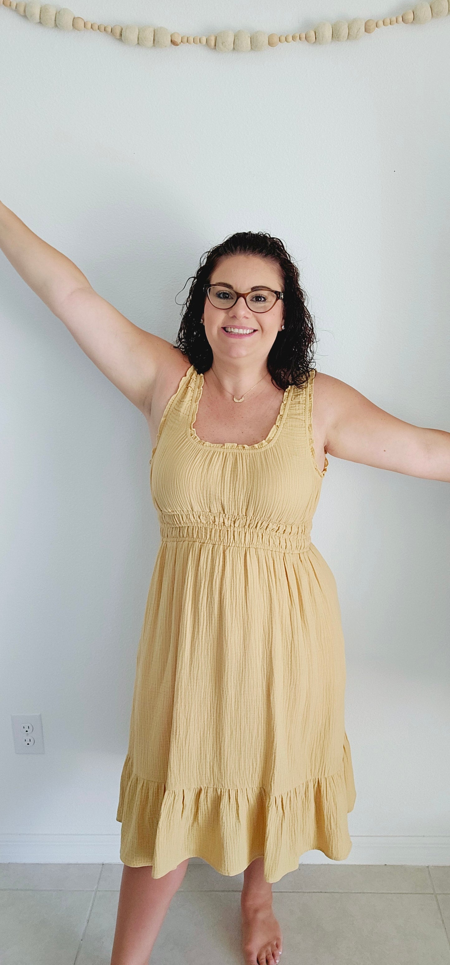 Get ready for a summer sensation with the Delilah tiered gauze midi dress! Made with lightweight cotton gauze, this dress features shirring, ruffles, and elastic for a perfect fit. Plus, pockets for convenience. It's the perfect dress for a fun and playful look. Sizes small through large.
