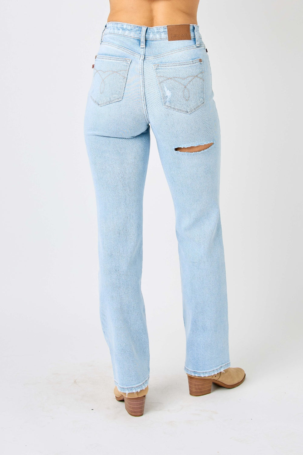 These high waist distressed straight jeans are a must-have. Their flattering cut accentuates your curves while the distressed details add an edgy vibe. Made with high-quality denim, they are both comfortable and durable. The high waist design also helps to cinch in your waist and create a slimming effect 0 -24W