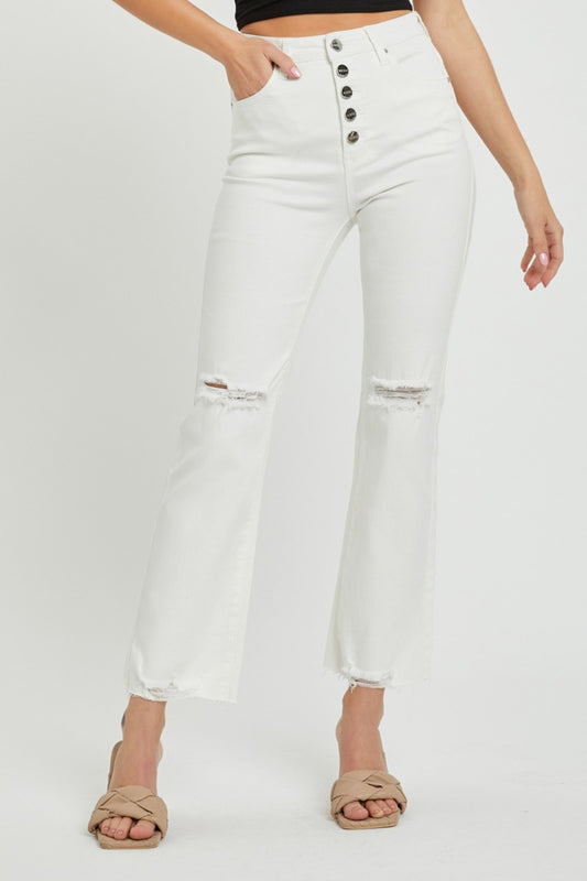 These high rise button fly straight ankle jeans are a stylish and on-trend choice for your everyday wardrobe. The high rise design creates a flattering and elongated silhouette. The button fly adds a touch of vintage charm and detail to the jeans. The straight leg cut offers a classic and versatile look that can be dressed up or down.  0-3X