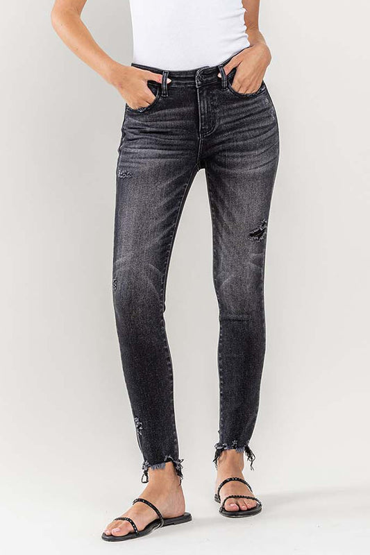 These raw hem cropped skinny jeans are a must-have for any fashion-forward individual. The raw hem adds a touch of edge to the classic skinny jeans silhouette. The cropped length is perfect for showcasing your favorite footwear. 24-32