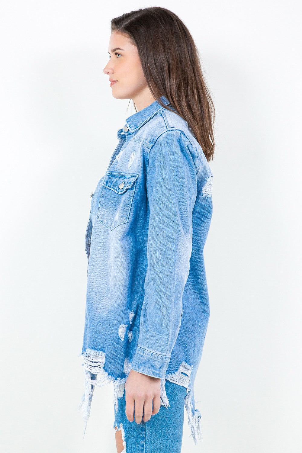 Introducing the Frayed Hem Distressed Denim Shirt Jacket. This stylish piece combines the timeless appeal of denim with a contemporary twist. The frayed hem adds a touch of edginess, while the distressed details create a worn-in look.  S - 3X
