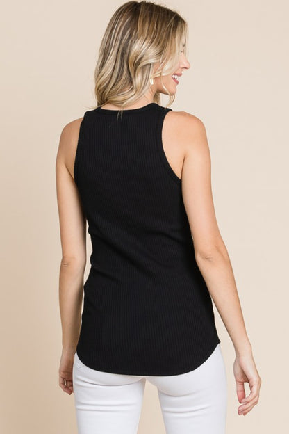 The Ribbed Round Neck Tank is a versatile and essential piece for any wardrobe. This tank top features a classic round neck and a ribbed texture that adds a touch of dimension to your outfit. Perfect for layering or wearing on its own, this tank is a versatile and comfortable option for everyday wear.
