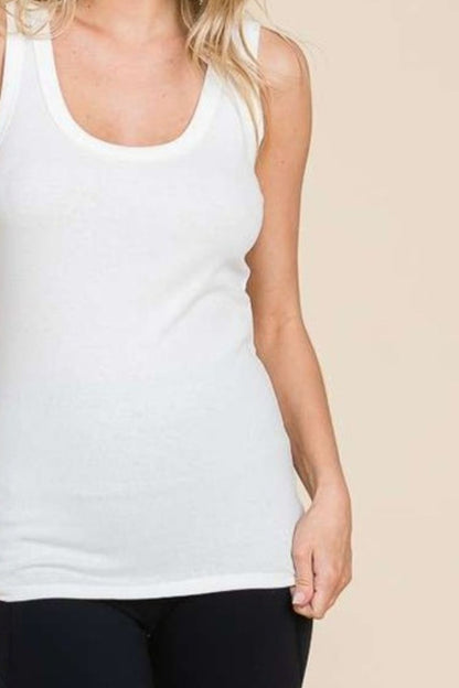 The Ribbed Scoop Neck Tank is a timeless and versatile piece that is a must-have in any wardrobe. Its classic design features a flattering scoop neckline and a ribbed texture, adding a stylish touch to any outfit. This tank top is perfect for layering under cardigans or jackets, or wearing on its own during warmer weather. S-3X