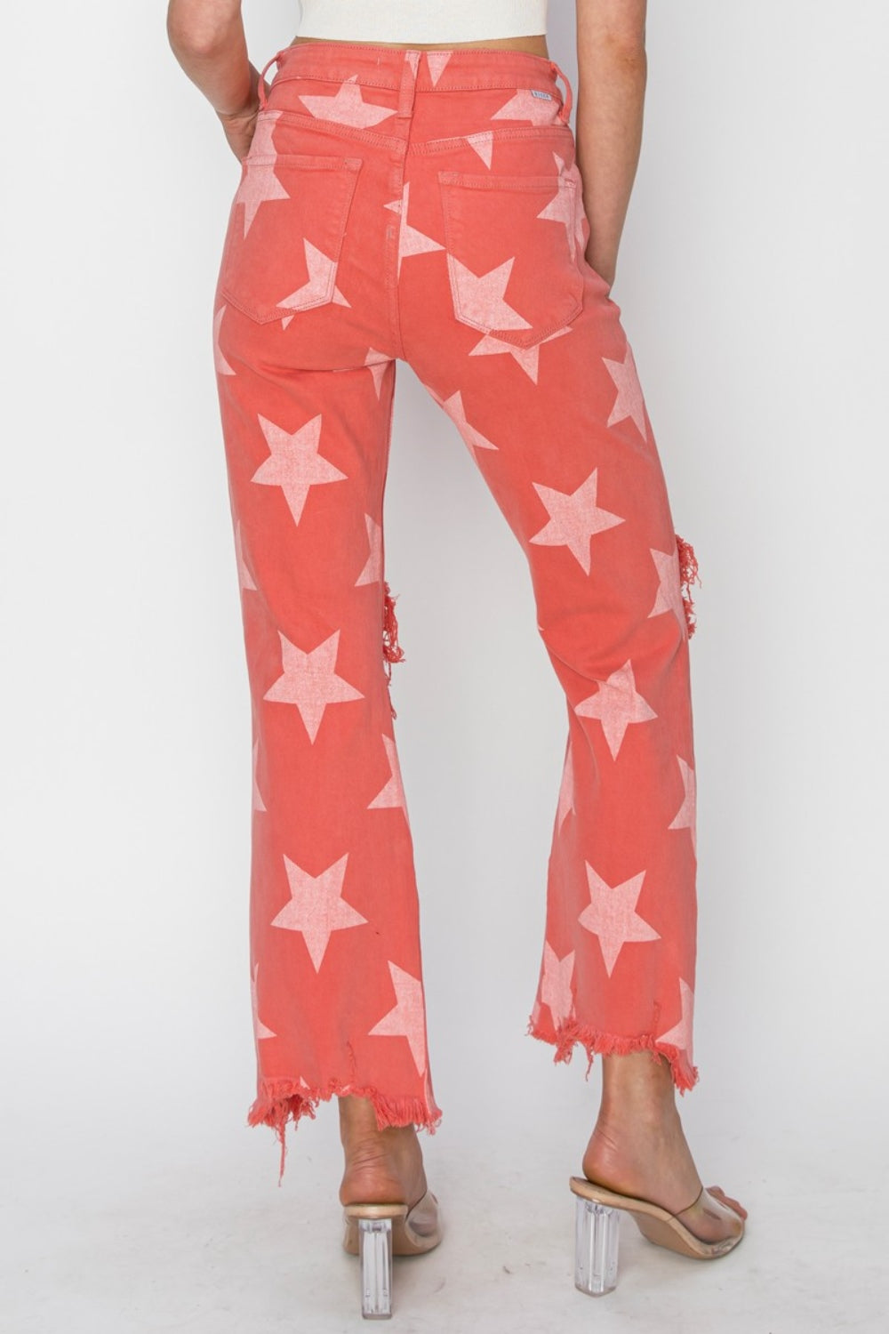 Distressed Raw Hem Star Pattern Jeans is a pair of jeans full of personality, with a unique star pattern and ripped treatment, showing a stylish rock 'n' roll style. The raw, unadorned edges at the cuffs add a touch of rebellion. These jeans are the perfect choice to show off your personality and fashion sense, whether paired with a t-shirt, shirt or jacket. Wear these jeans to make you stand out from the crowd and take center stage.