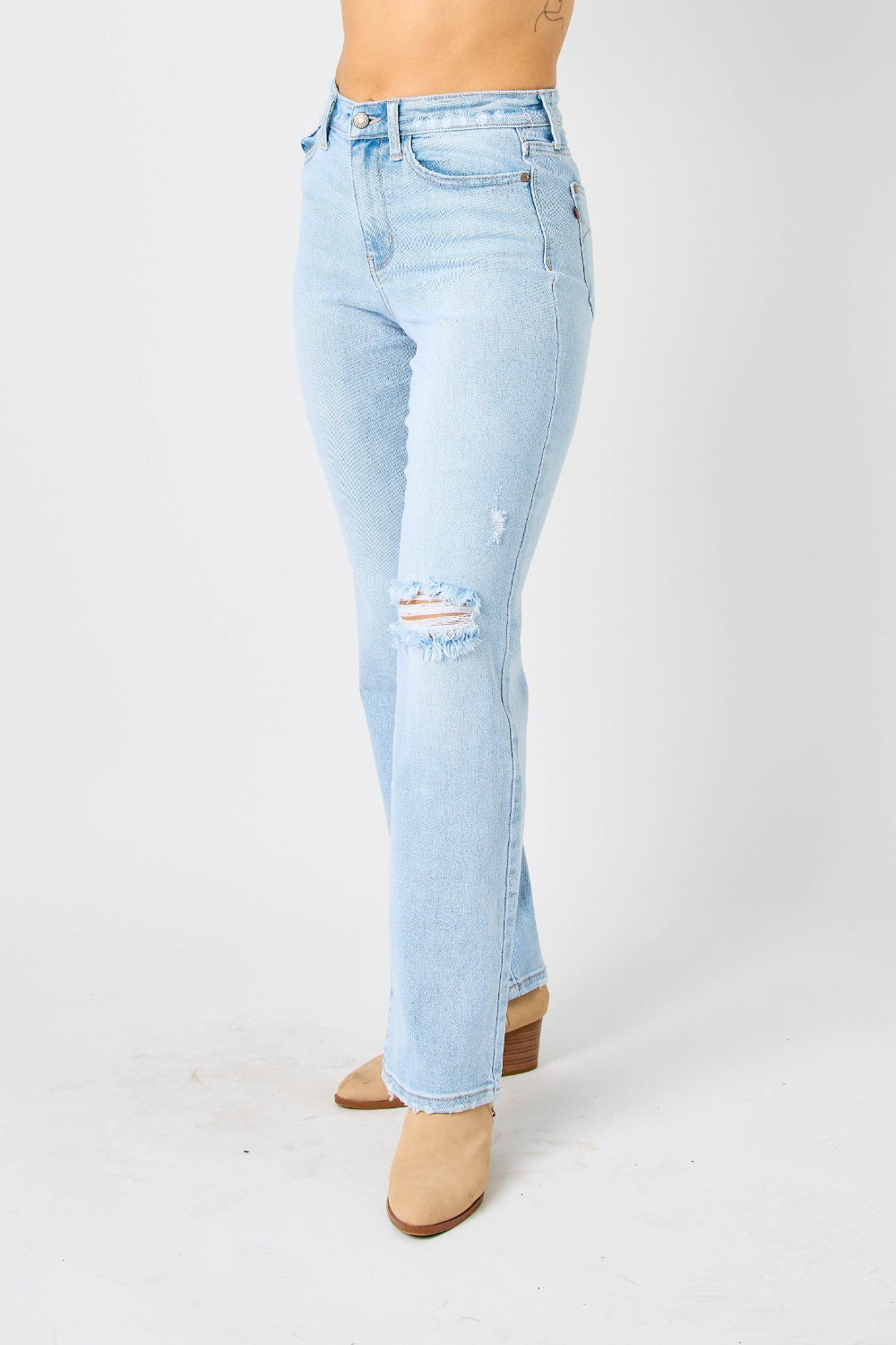 These high waist distressed straight jeans are a must-have. Their flattering cut accentuates your curves while the distressed details add an edgy vibe. Made with high-quality denim, they are both comfortable and durable. The high waist design also helps to cinch in your waist and create a slimming effect 0 -24W