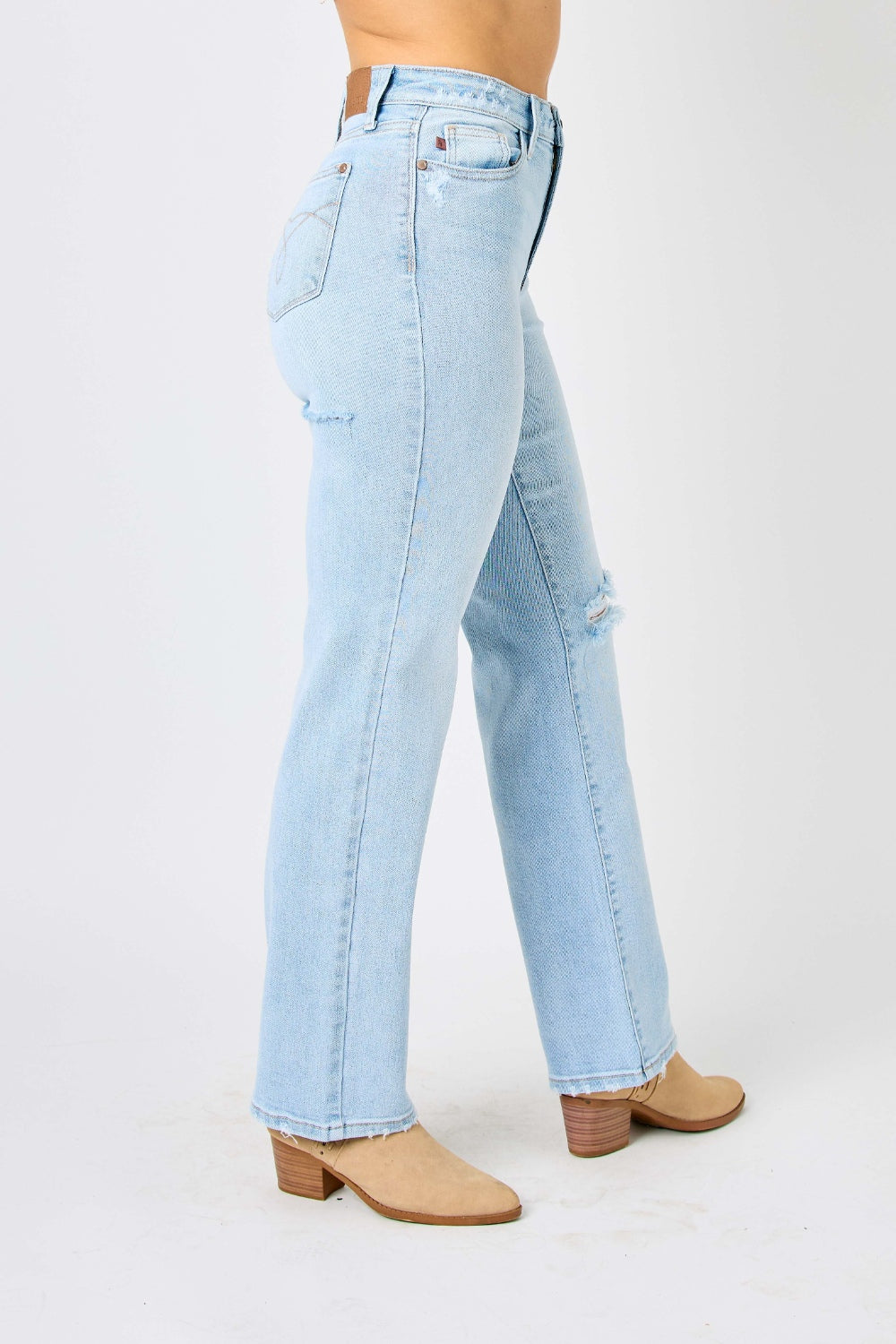 These high waist distressed straight jeans are a must-have. Their flattering cut accentuates your curves while the distressed details add an edgy vibe. Made with high-quality denim, they are both comfortable and durable. The high waist design also helps to cinch in your waist and create a slimming effect 0 -24W
