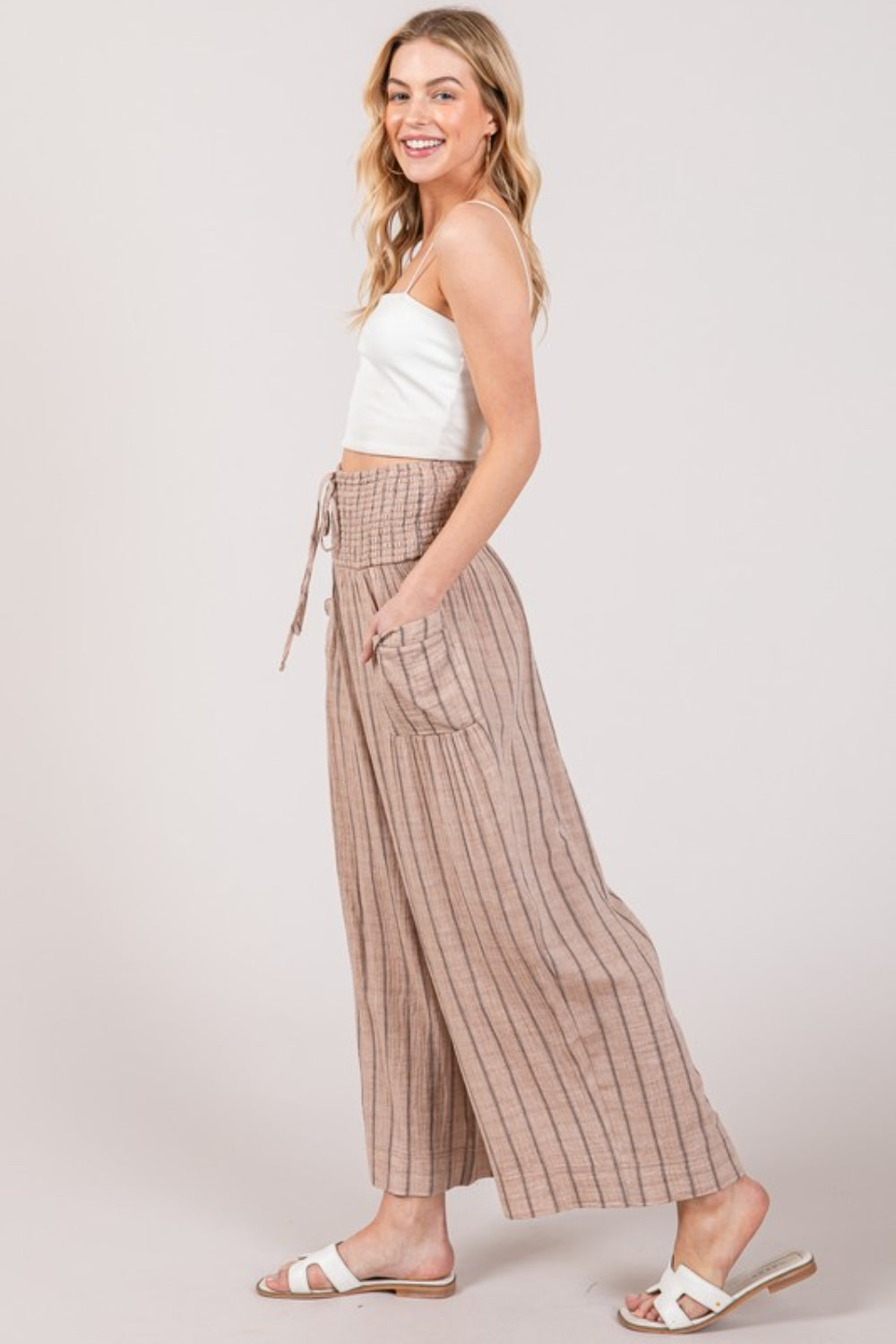 The Cotton Gauze Wash Stripe Pants are a comfortable and stylish choice for a casual and laid-back look. These pants feature a breathable cotton gauze fabric with a washed stripe pattern, adding a touch of texture and interest to your outfit.