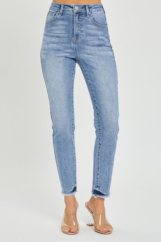 These high rise frayed hem skinny jeans are a trendy and versatile addition to your closet. The high rise design helps create a flattering silhouette and provides extra coverage. The frayed hem adds a touch of edge and style to the classic skinny jeans. 