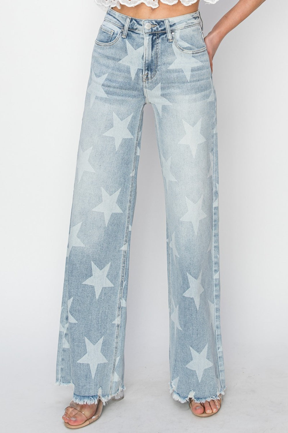 The Raw Hem Star Wide Leg Jeans are a fashionable and eye-catching choice for those looking to make a statement with their outfit. The raw hem detail gives these jeans a casual and edgy vibe, while the star embellishments add a touch of whimsical charm. The wide leg silhouette offers a comfortable and flattering fit, making them a versatile piece that can be dressed up or down. S-3X