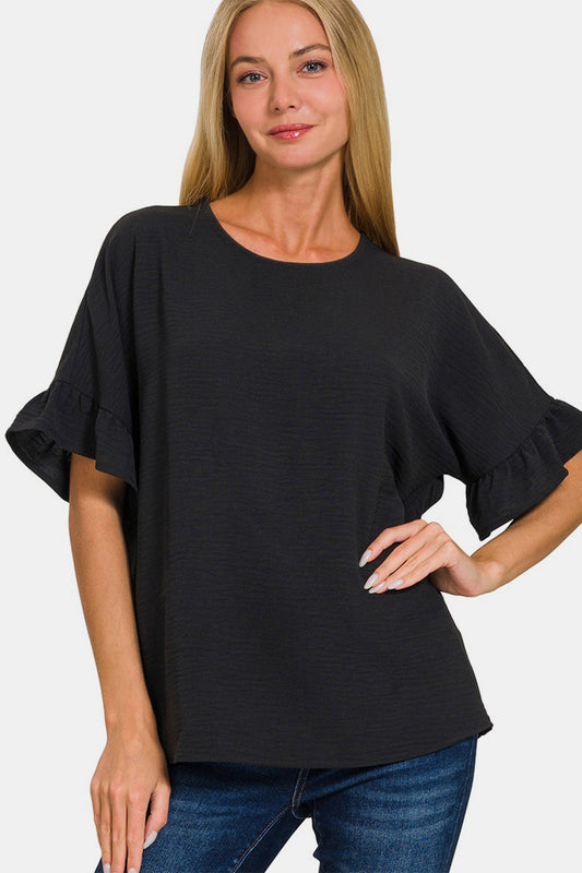 This V-Neck Flutter Sleeve Top is a versatile and feminine addition to your wardrobe. The V-neckline adds a flattering touch to the design. The flutter sleeves give a soft and romantic feel to this top. Perfect for both casual and dressy occasions, this top can be dressed up or down effortlessly. Pair it with jeans for a casual look or with a skirt for a more polished outfit.  S-XL