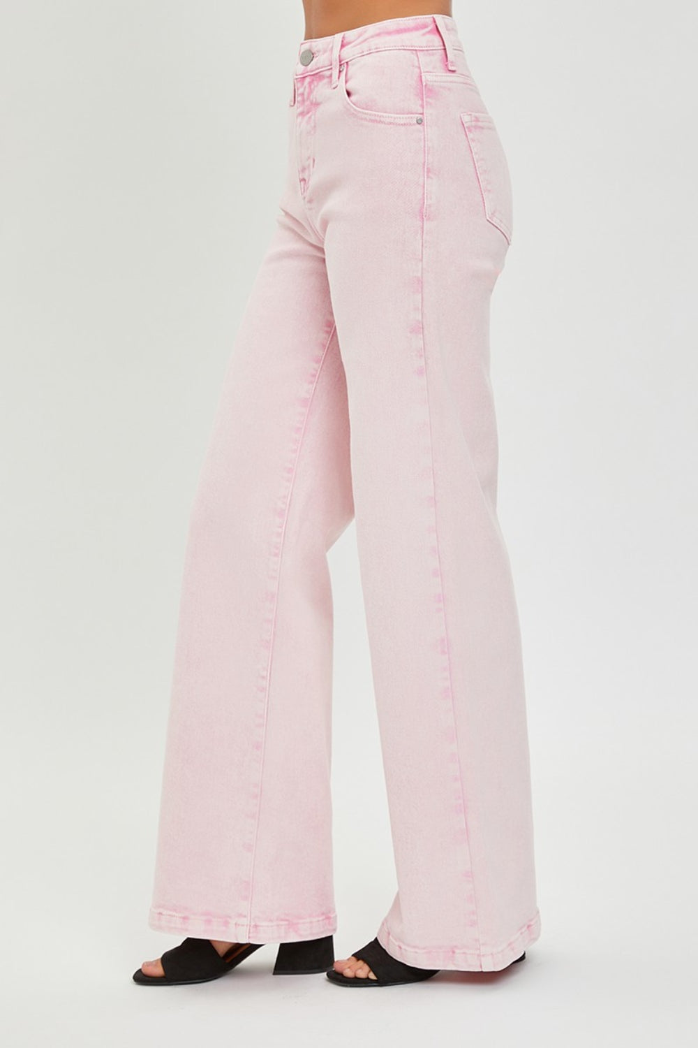 These high rise tummy control wide leg jeans are a flattering and stylish choice for any wardrobe. The high rise design helps slim and shape your midsection. The wide leg silhouette adds a touch of retro flair to your look.  0-3X