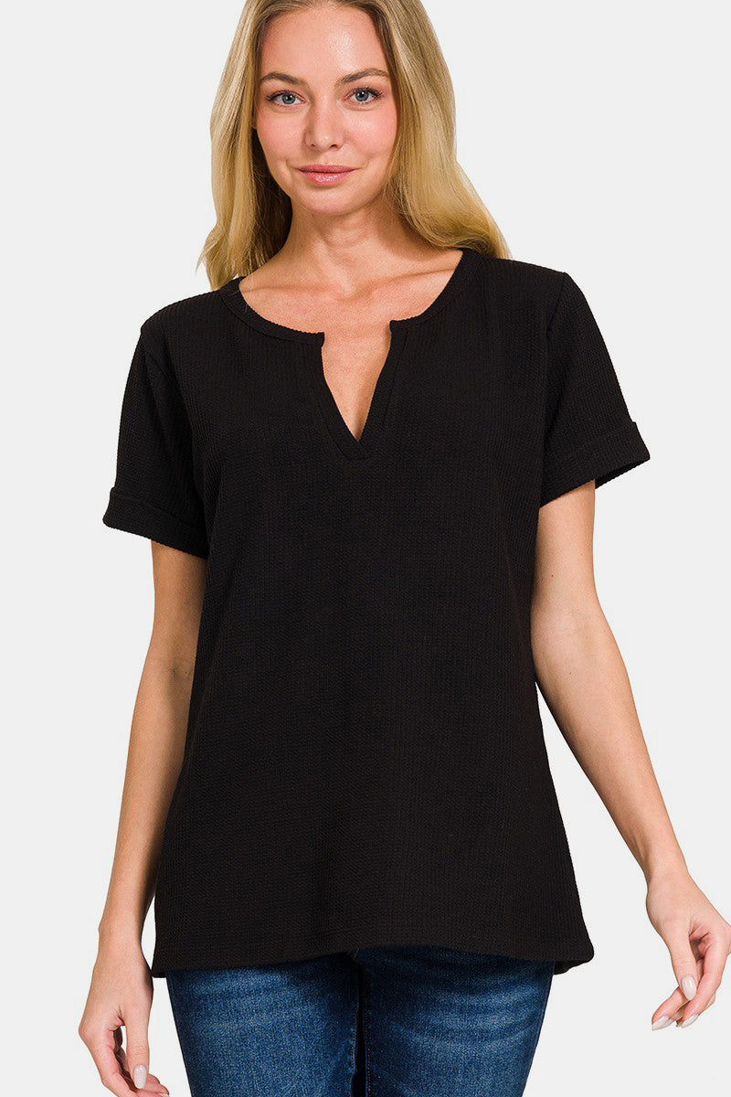 The notched short sleeve waffle T-shirt is a stylish and modern addition to your casual wardrobe. With its unique notched detail and waffle texture, this T-shirt offers a contemporary twist on a classic style. S-L