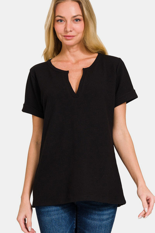 The notched short sleeve waffle T-shirt is a stylish and modern addition to your casual wardrobe. With its unique notched detail and waffle texture, this T-shirt offers a contemporary twist on a classic style. S-L