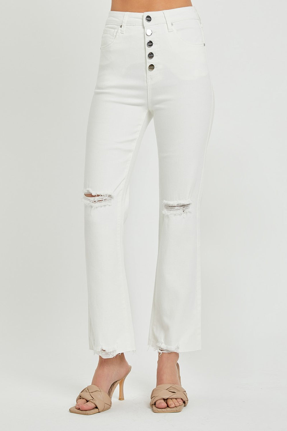 These high rise button fly straight ankle jeans are a stylish and on-trend choice for your everyday wardrobe. The high rise design creates a flattering and elongated silhouette. The button fly adds a touch of vintage charm and detail to the jeans. The straight leg cut offers a classic and versatile look that can be dressed up or down.  0-3X