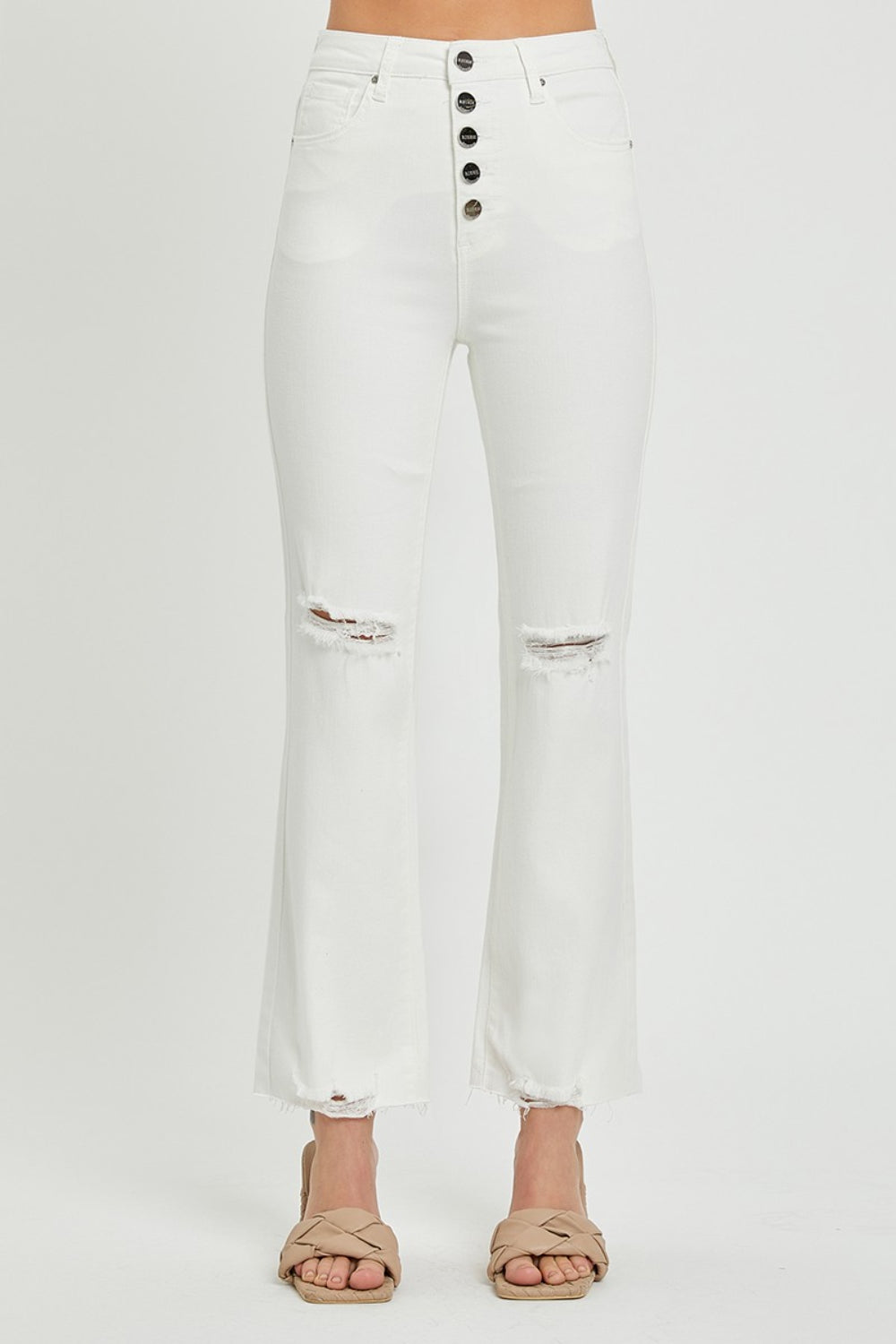 These high rise button fly straight ankle jeans are a stylish and on-trend choice for your everyday wardrobe. The high rise design creates a flattering and elongated silhouette. The button fly adds a touch of vintage charm and detail to the jeans. The straight leg cut offers a classic and versatile look that can be dressed up or down.  0-3X