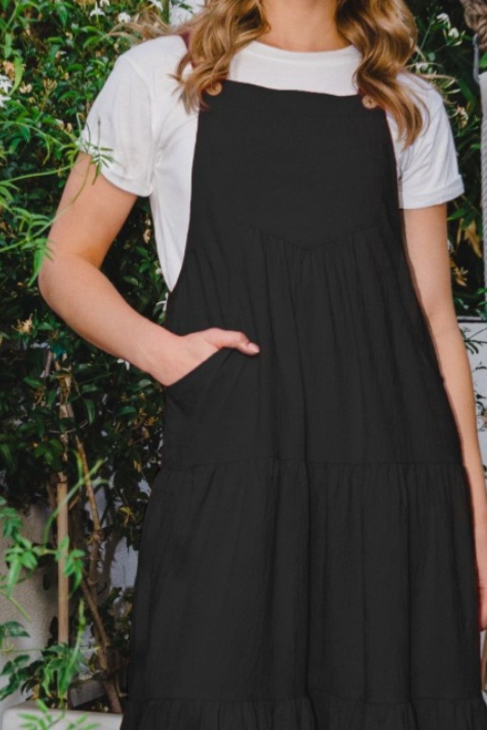 Make a statement in this Sleeveless Tiered Midi Dress, featuring a flattering and flowy tiered design that exudes both style and sophistication. The sleeveless silhouette allows for ease of movement and breathability, making it perfect for warm-weather occasions. Crafted from high-quality fabric, this midi dress offers a comfortable and elegant fit that is sure to turn heads. S-3X