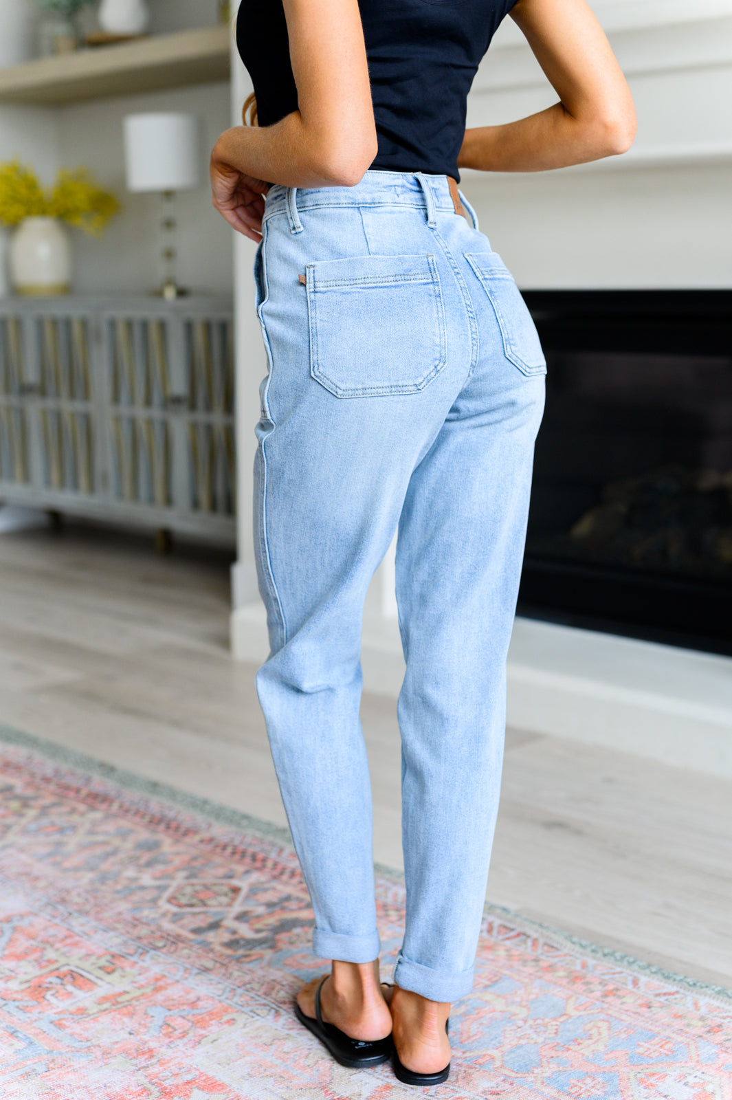 Get a retro-inspired look with our Cooper High Rise Vintage Denim Jogger! This jogger features a high rise design and a light wash for a vintage feel. The self-tie drawstring adds a touch of style, perfect for any casual outing. 0-24w