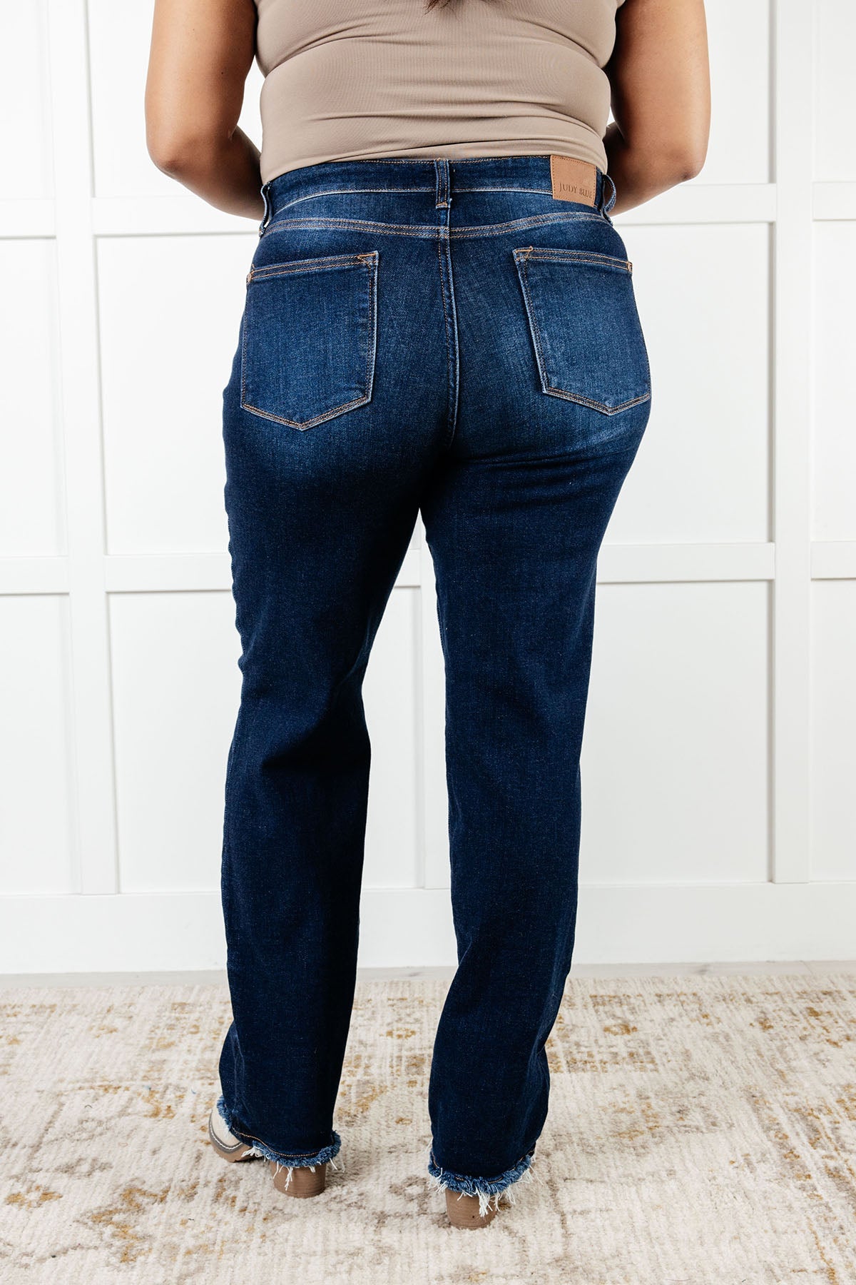 The Jacqueline Mid Rise Jean will elevate your casual look with its dark wash and non-distressed design. The straight leg silhouette flatters any figure, while the frayed hem adds a touch of playful flair. Perfect for any occasion, this jean is a must-have for your wardrobe.
Judy Blue
Mid Rise
Zip Fly
Dark Wash
Straight Leg Silhouette
Raw Hem
93% Cotton, 6% Polyester, 1% Spandex
True to Judy Blue Sizing