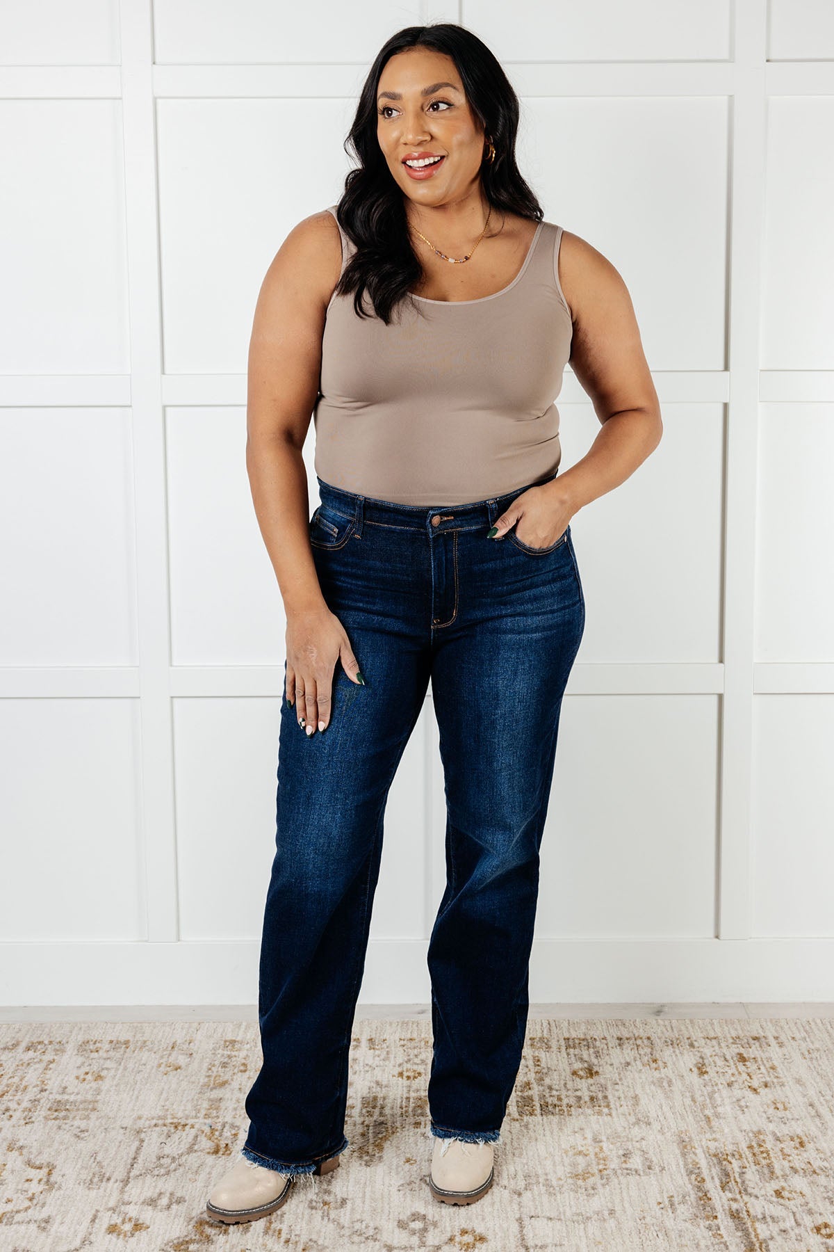 The Jacqueline Mid Rise Jean will elevate your casual look with its dark wash and non-distressed design. The straight leg silhouette flatters any figure, while the frayed hem adds a touch of playful flair. Perfect for any occasion, this jean is a must-have for your wardrobe.
Judy Blue
Mid Rise
Zip Fly
Dark Wash
Straight Leg Silhouette
Raw Hem
93% Cotton, 6% Polyester, 1% Spandex
True to Judy Blue Sizing