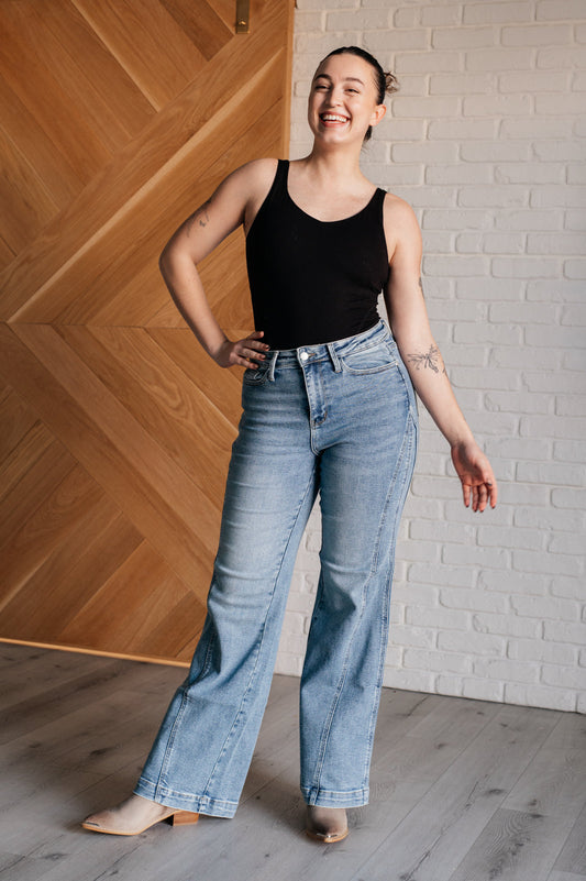 Get ready to make a statement with our Melia High Rise Side Seam Detail Wide Leg Jeans! The light wash and non-distressed design give a retro vibe, while the asymmetrical side seam detail adds an unexpected twist. With a high rise fit, you'll feel comfortable and trendy.
High Rise
Zip Fly
Light Wash
4-Way Stretch
Asymmetrical Side Seam Detail
Retro Wide Leg Fit
94% Cotton, 5% Polyester, 1% Spandex
True to Judy Blue Sizing