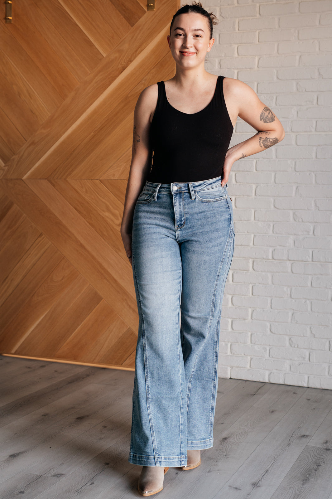 Get ready to make a statement with our Melia High Rise Side Seam Detail Wide Leg Jeans! The light wash and non-distressed design give a retro vibe, while the asymmetrical side seam detail adds an unexpected twist. With a high rise fit, you'll feel comfortable and trendy.
High Rise
Zip Fly
Light Wash
4-Way Stretch
Asymmetrical Side Seam Detail
Retro Wide Leg Fit
94% Cotton, 5% Polyester, 1% Spandex
True to Judy Blue Sizing