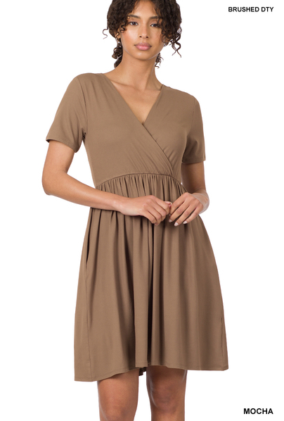 Stay cute, feminine, elegant and flattering at all times in this short sleeve mini dress. Featuring surplice neckline and pockets, this dress is ideal for all occasions. Sizes small though x-large.