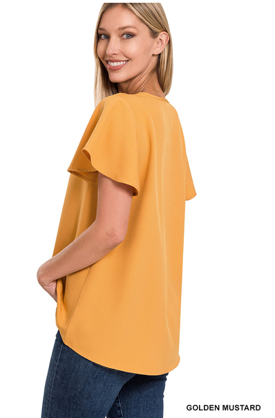Harvest some style in this Dandelion Fields Golden Mustard Top! Featuring a woven flutter sleeve v-neck - it's the perfect outfit choice to spice up any look! Guaranteed to make you stand out like a ray of sunshine. Sizes small through x-large.