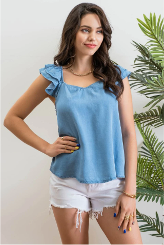 Look sharp and stylish this summer in our "Ashley Chambray Denim" top! Its flattering sweetheart neckline and sassy ruffle sleeves give you a unique, standout look. Plus, the square back neckline with elastic adds comfort! So why wait? Get out there and show off your denim 'look' with attitude.